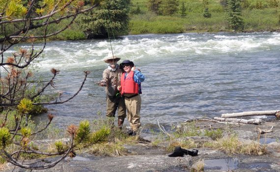 Number two son with Papa Ray and soon to be released Grayling at the Grayling Hole #Spatsizi